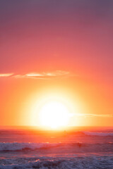 Fototapeta na wymiar Sunlit sky ocean sunrise