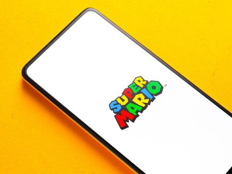 Assam, india - October 11, 2020 : Super mario logo on phone screen stock image.