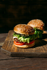 juicy burger on a wooden background