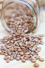 Jar of Pinto Beans Spilled on Kitchen Table