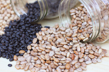 Jars of Black-eyed Peas, Chick Peas, Black Beans and Pinto Beans Spilled in Kitchen