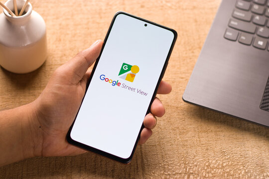 Assam, india - May 29, 2021 : Google Street View logo on phone screen stock image.