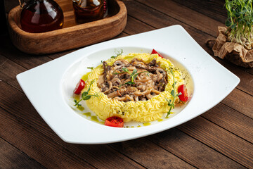 Stroganov veal with mashed potatoes and mushrooms in cream sauce
