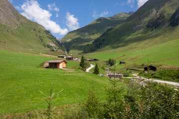 Fototapeta na wymiar The Malga Fane hut in Valles, near Rio di Pusteria, is considered the most beautiful alpine village in South Tyrol.