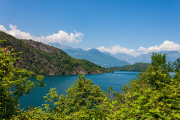 A view of the Piona lake, in the Como lake, near Colico. In the background, from the left, Cima del Lägh, Pizz Gallagiun and Pizzo Cengalo