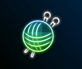 Glowing neon line Yarn ball with knitting needles icon isolated on black background. Label for hand made, knitting or tailor shop. Colorful outline concept. Vector