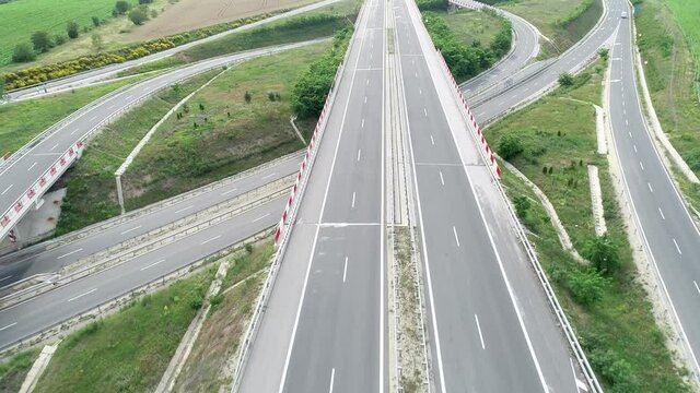 Aerial view of Highway and overpass. Road junction. Transportation and infrastructure development
