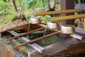 Water fountain at the intrance of a shrine in Shimoda, Japan