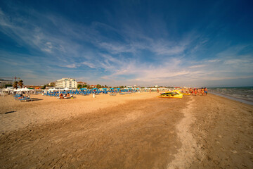 Rimini sand beach landscape. Panoramic view of one of most  large and long beach in Italy - 452873007