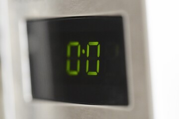 Closeup macro of numbers on a microwave