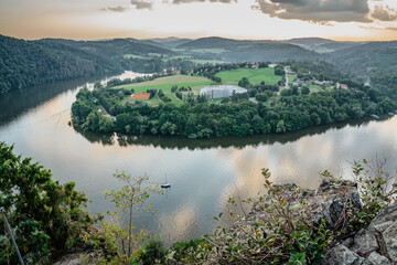 Vltava river horseshoe shape meander from Albert viewpoint close to Smilovice,Czech Republic.Beautiful landscape with river canyon at sunset.Scenic view of Czech countryside with water reflection