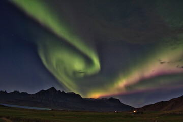 aurora borealis over the mountains in Iceland