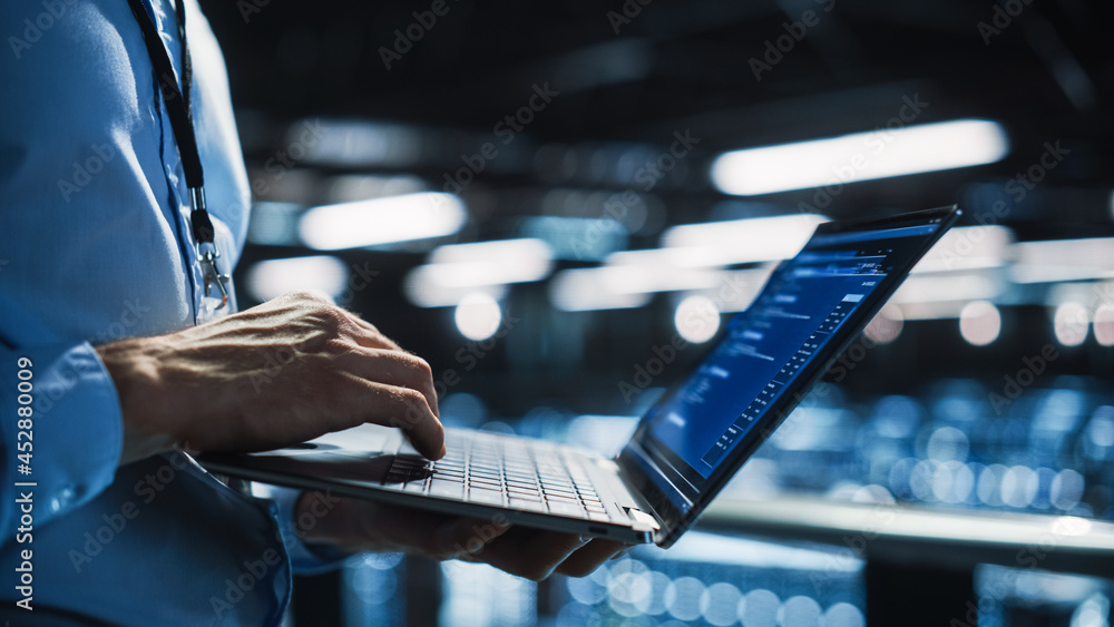 Poster Data Center Programmer Using Digital Laptop Computer, Maintenance IT Specialist. Cloud Computing Server Farm System Administrator Working on Cyber Security for Iaas, saas, paas. Closeup Focus on Hands
