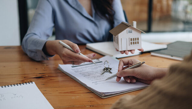 Legal Consultants, Notary Or Justice Lawyer Discussing Contract Document On Desk With Client Customer In Courtroom Office, Business, Justice Law, Insurance, Legal Service, Buy And Sell House Concept