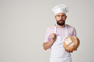 man in chef's clothes baker flour products cooking work