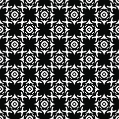 Flower geometric pattern. Seamless vector background. White and black ornament. Ornament for fabric, wallpaper, packaging. Decorative print 