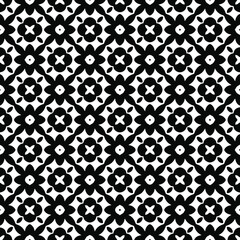 Flower geometric pattern. Seamless vector background. White and black ornament. Ornament for fabric, wallpaper, packaging. 

Decorative print
