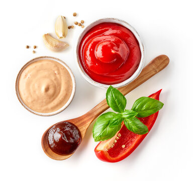 Ketchup, Burger Sauce, Barbecue Sauce, Red Bell Pepper, Basil, Garlic And White Pepper Isolated On White, From Above