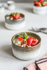 Strawberry, cream cheese and feta cream and crumble crust dessert. Homemade Sweet and salty cheesecake. Trifle. Selective focus