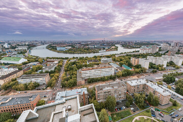 Aerial city view by the river at sunset. Moscow.