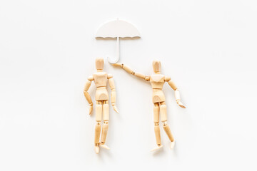 Mental and emotional gender difference between man and woman. Two wooden mannequin figurine connection