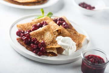Homemade crepes with cherries