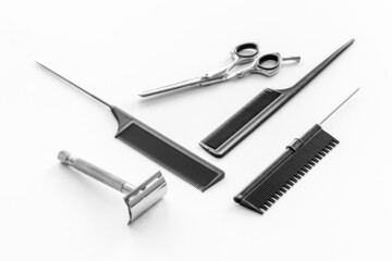 Barber tools with hairdressing scissors and combs