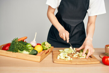 cutting vegetables in the kitchen cooking healthy eating close-up