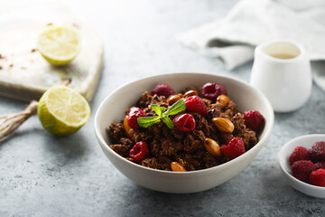 Homemade chocolate granola with raspberry