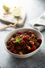 Homemade chocolate granola with raspberry