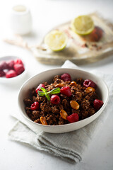 Homemade chocolate granola with raspberry