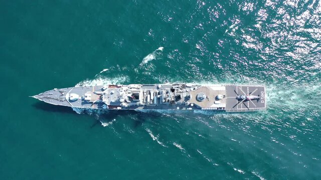 Aerial view of naval ship, battle ship, warship, Military ship resilient and armed with weapon systems, though armament on troop transports. support navy ship. Military sea transport.