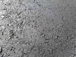 New asphalt on the road. New road. The quality of the road surface.