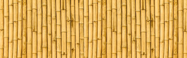 Panorama of Brown old Bamboo fence texture and background seamless