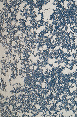 White and blue Textured putty on the wall..
