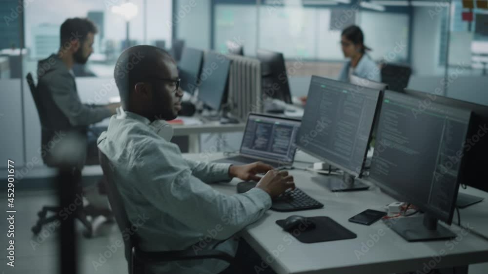 Aufkleber Authentic Office: Enthusiastic Black IT Programmer Starts Working on Desktop Computer. Male Website Developer, Software Engineer Developing App, Video Game. Terminal with Coding Programming Language