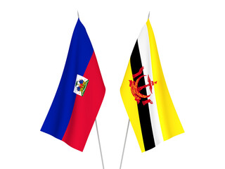 National fabric flags of Republic of Haiti and Brunei isolated on white background. 3d rendering illustration.