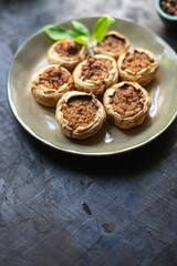 stuffed mushroom mushrooms stuffed baked no meat fresh portion ready to eat meal snack on the table copy space food background rustic. top view keto or paleo diet veggie vegan or vegetarian food