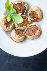 stuffed mushroom mushrooms stuffed baked no meat fresh portion ready to eat meal snack on the table copy space food background rustic. top view keto or paleo diet veggie vegan or vegetarian food