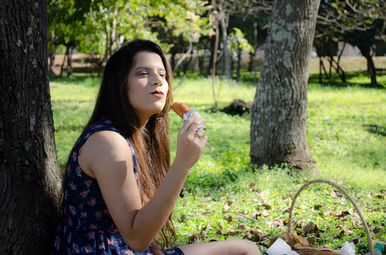 Woman Eating A Twinkie 