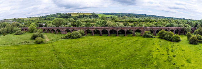 An aerial panorama view towards the Hockley viaduct at Winchester, UK in early summer