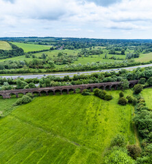 An aerial panorama view towards the Hockley viaduct and adjacent M3 motorway at Winchester, UK in early summer