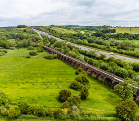 An aerial panorama view along the Hockley viaduct and adjacent M3 motorway at Winchester, UK in...