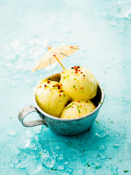 Tropical Ice Cream In A Cup With Umbrella