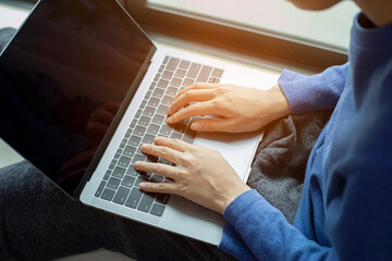 Closeup woman working remotely at home, Man typing on laptop or computer
