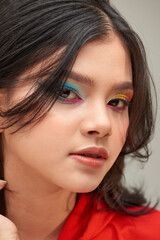 Obraz premium Close-up of excited party girl in pink wig and bright makeup looking impressed,