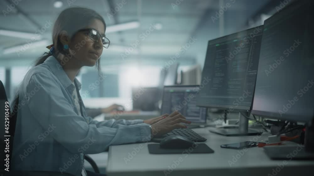 Fototapete Diverse Office: Enthusiastic Indian IT Programmer Working on Desktop Computer. Female Specialist Creating Innovative Software. Engineer Developing App, Program, Video Game. Writing Code in Terminal