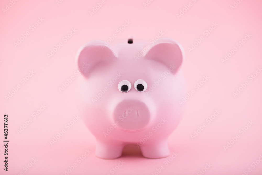 Poster pink piggy bank on pink background