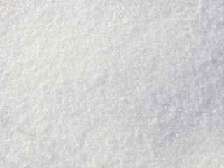 White snowy background of freshly fallen snow flakes