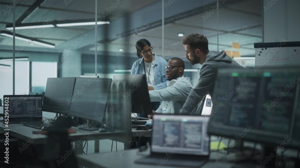 Aufkleber Diverse Multi-Ethnic Team Working in Modern Office: Group of IT Programmers Gather Around Desktop Computer, Talking, Finding Solution. Specialists Create Software. Engineers Develop App, Program
